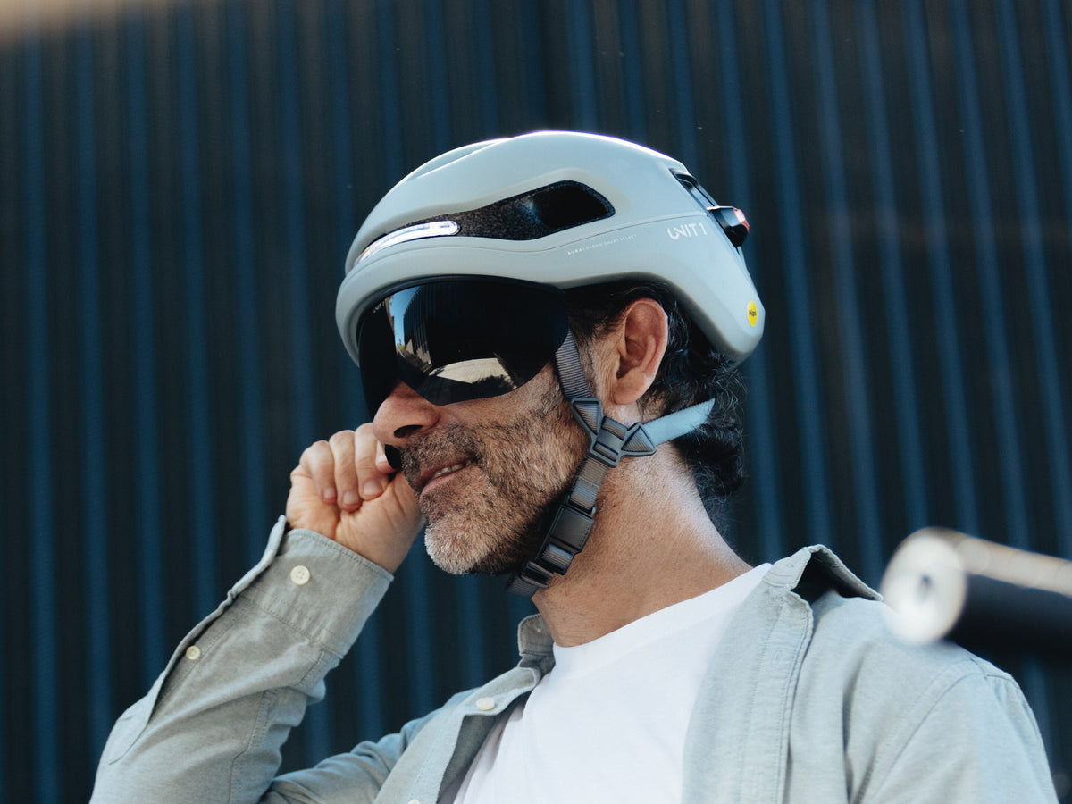 men wearing smart helmet  with visor while riding 