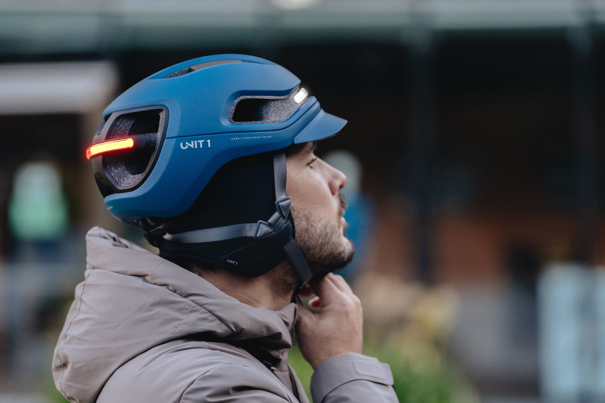 Cyclist with UNIT 1 liner and AURA helmet in winter