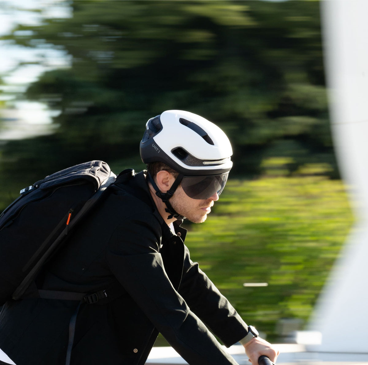 Men wearing AURA for onewheel riding