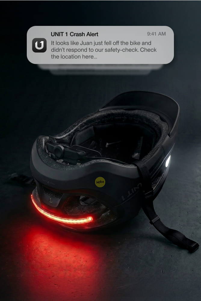 Casque UNIT 1 avec feu arrière rouge et notification d'alerte en cas d'accident sur le téléphone