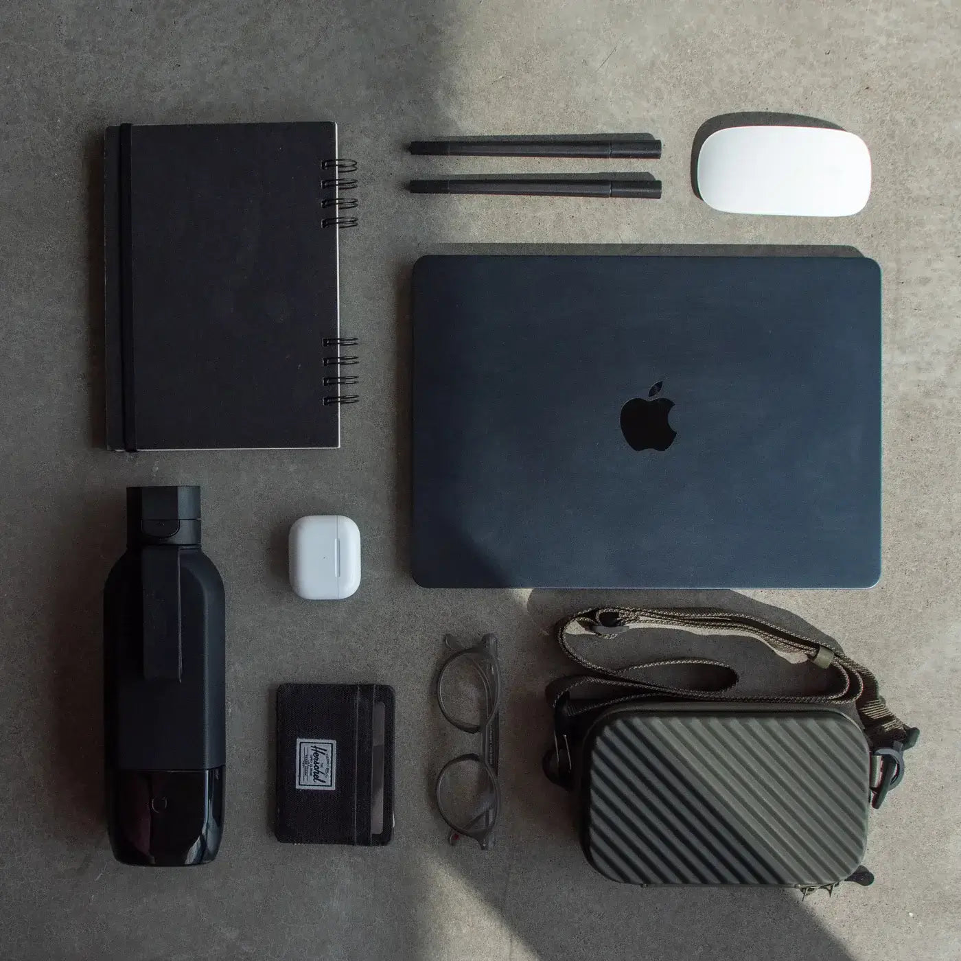 UNIT 1 Water Bottle in Charcoal Black Color comparing size with other products